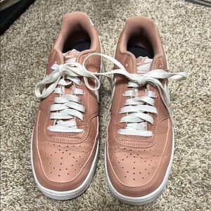 Nike Pink Sneakers with White Laces and Smooth Leather